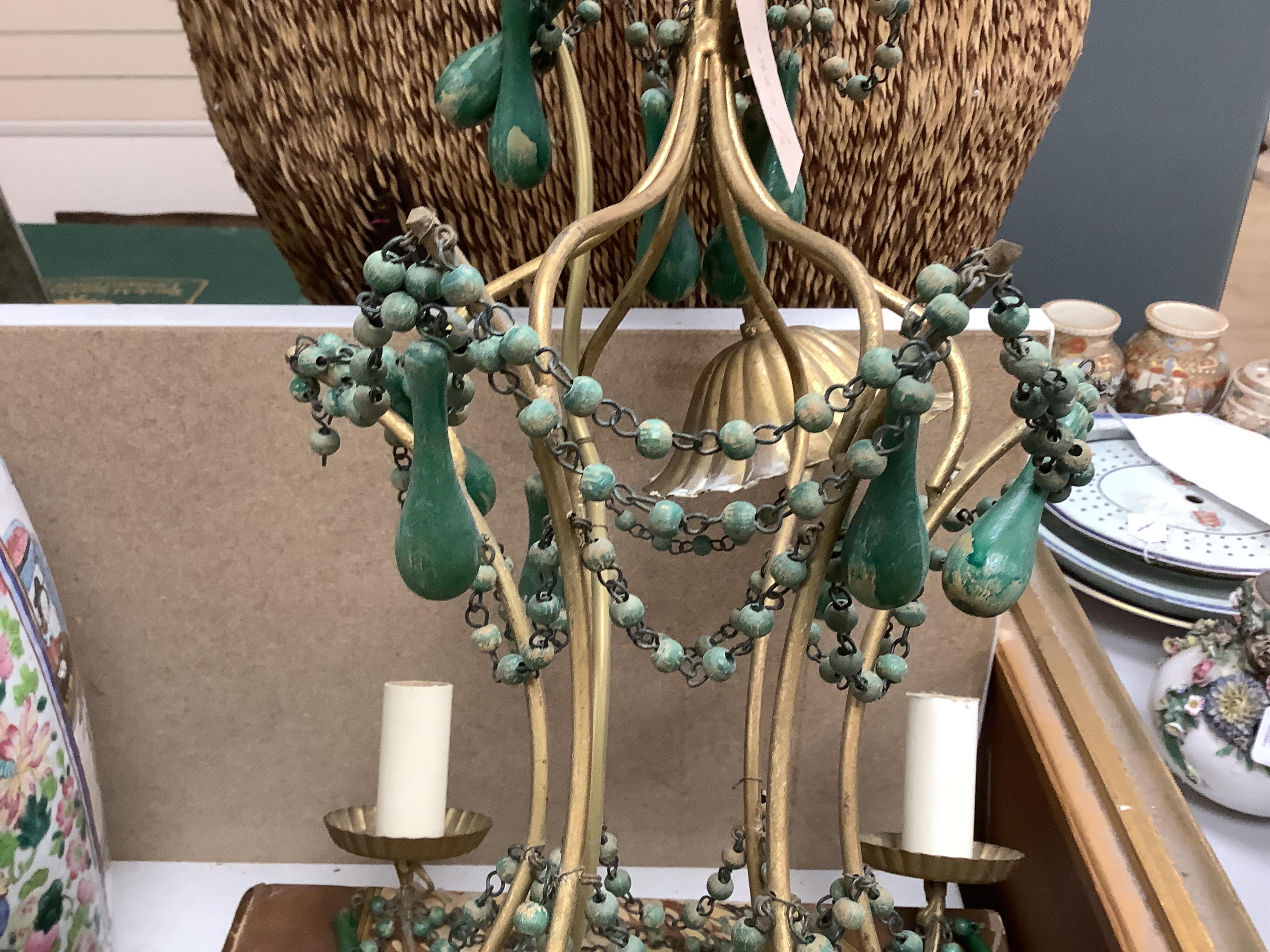 A beaded and gilt metal six branch electrolier, 86cm high